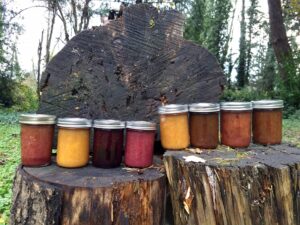 5 preserves against a wood background